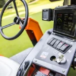 Control panel of Smithco Spray Star 1200 E showing advanced GPS display and operational controls for precise turf maintenance.